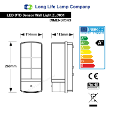 An outdoor light fixture on the front porch and a lamp in the living room. 7w Led Bulkhead Dusk To Dawn Sensor Security Light Very Bright 100w Output Warm White Light