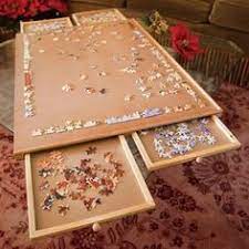 Cherish every moment once you go through the best jigsaw puzzle tables review online. 36 Puzzle Tables Organizers Ideas Puzzle Table Puzzle Jigsaw Puzzle Table