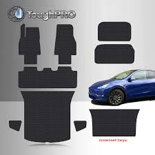 The tesla model y is an electric compact crossover utility vehicle (cuv) by tesla, inc. Amazon Com Toughpro Floor Mat Accessories Complete Set Compatible With Tesla Model Y Performance 5 Seater All Weather Heavy Duty Custom Fit Black Rubber 2020 2021 Automotive
