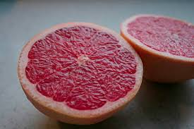 Jessy freimann, the life jolie place the grapefruit on the cutting board so that the top and bottom of it are on either side and the actual side of the. Hd Wallpaper Citrus Cut Food Fresh Fruit Grapefruit Half Nature Organic Wallpaper Flare
