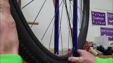 How to true a unicycle wheel - YouTube