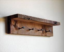 Upon her return from work, she will be amazed by your thoughtfulness. Rustic Key Rack Barn Wood Shelf With Key Hooks Rustic Key Etsy Rustic Keys Rustic Coat Rack Reclaimed Wood Towel Rack