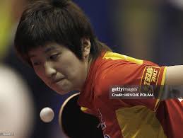 Yan Yao of China returns a ball to Yue Guo of China during their 1/8...  News Photo