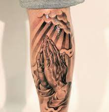50 Wonderful Praying Hands Tattoo Ideas For Guys Praying Hands Tattoo Hands Tattoo Tattoos