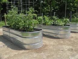 Using careful measurements, determine where the tub will be. Stock Tank Planters Add New Dimension To Home Gardens