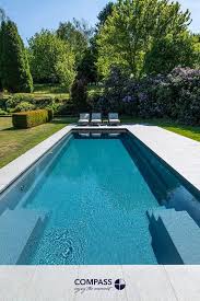 piscine de reve moderne dans le jardin compass pools belgium