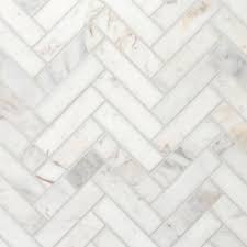 The grout between the marble tiles is very fine and the same color as the main one in the marble has never got any mildew on it and we rarely wipe it down between showers and only give it a monthly clean. Volakas Herringbone Honed Marble Mosaic 13 X 7 100886043 Floor And Decor