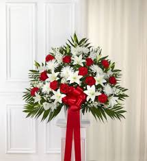 Symapthy flowers with red roses white lilies bells of ireland eucalyptus hypericum and gladiolus. Heartfelt Sympathies Red White Funeral Flowers In Brooklyn Ny Mary S Florist Corp