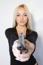 The blonde with a pistol stock image. Image of beauty - 3923921