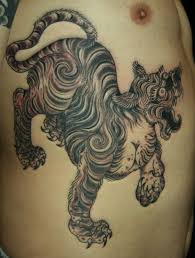 There are as many answers to that question as there are designs available. Black Asian Tiger Tattoo On Ribs Tattooimages Biz