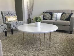 White Round Table Top With Gold Hairpin Legs Had The Tabletop Custom Made And Spraypainted The Hairpin Legs White Round Tables Round Table Top Coffee Table
