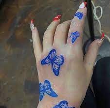 Tattoo Ideas Pin Ittybittypiggyy Follow For More Butterfly Hand Tattoo Butterfly Tattoos On Arm Blue Butterfly Tattoo