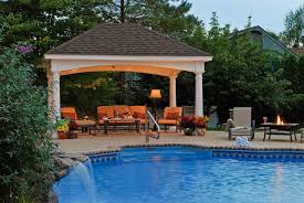 A breezy gazebo at the foot of the pool provides an escape after a few laps. Gazebo Ideas Your Home Needs
