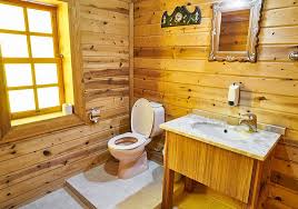 Wood wainscot and logs are general to imitator the appearance of a log cabin or chalet. Beautify Your Bathroom Bathroom Vanities Beautiful Touches