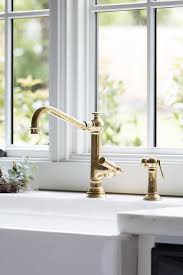 an antique brass vintage faucet is