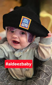 I mean ... I know this group will fully appreciate how funny this is. This  is an adult hat but since my little guy is in a helmet, it fit him  perfectly. |