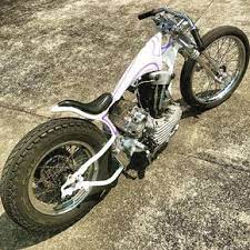 image may contain motorcycle and outdoor bobber bikes chopper bike motorcycle art