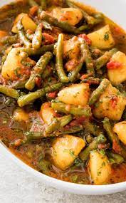 Mediterranean Braised Green Beans With Potatoes And Basil Cook S Illustrated Recipe Braised Greens Vegetable Recipes Vegetable Side Dishes