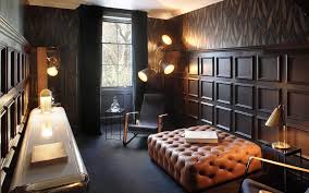 Luxurious accessories, such as large chandelier on the main landing, were added to instill a sophisticated feel throughout. Workspaces Shh