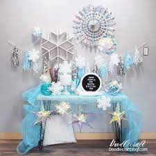 These coloured hanging decorations are sure to brighten up any entertainment room. Frozen Inpsired Party With Blue Silver Snowflakes