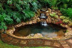 Square of pond liner and lay it in the center as padding for the two concrete blocks. 17 Flagstone Waterfalls Ideas Backyard Ponds Backyard Flagstone