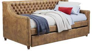 Trundle bed frames with upholstery make ample space for sitting up to read or watch television in bed. Alena Brown 3 Pc Twin Daybed With Trundle