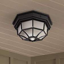 If don't want to come home to a dark and foreboding house or would rather not leave the front porch light on continuously while you are on. Octagonal 12 Wide Black Motion Sensor Outdoor Ceiling Light H7011 Lamps Plus