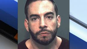 Man arrested after bringing gun to Disney World