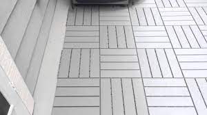 Look what we found while out preview a condo today. Ikea Snap Together Patio Floor Covering Youtube