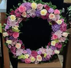 Dealing with a death of a family member, friend, or acquaintance is never an easy thing to accept or go through. Spring Floral Sympathy Wreath In Newton Ma The Crimson Petal Inc
