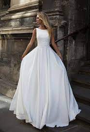 A look at real and fictional wedding dresses worn by characters, cartoons, celebrities, and even royalty. Modern Wedding Dress White Bridal Dresses Spaghetti Strap Wedding Dress Lace Homecoming Dresses