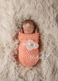 A knitted baby cocoon is such a useful item to have when you have a baby; How To Crochet A Baby Cocoon That Will Make A Perfect Baby Gift