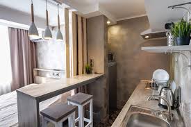 Planning a vacation in singapore? View Of The Kitchen And Bar In A Small Hotel Room Studio Wit