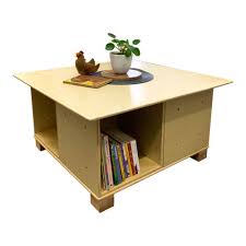 This coffee table is square but not a boring cube. Four Cube Coffee Table