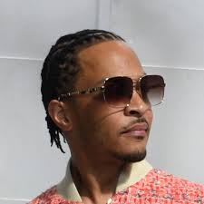 T.I looked disappointed during interview after King Harris, 19, was unable  to spell 'Tomorrow' when asked by 2 Chainz 8 year old son. King responded  “T-M-O-R-R-O” before being corrected by the 8 year old.