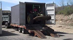If you need your shipping container to move overseas, costs can be either cheap or expensive depending on where the container is going. John Deere Tractor Loaded In A Shipping Container Youtube