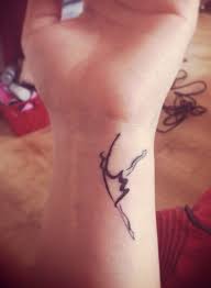 Black monochrome tattoo with sharp lines on the shoulder. Dance Tattoo Find Some Good Image Ideas Body Tattoo Art