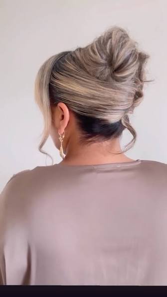 Sleek French twist with soft waves and a touch of glam #ElegantUpdo #ChicStyle #updo