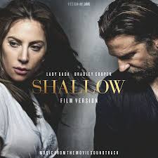 A female singer (ally) goes from unknown to rich and famous. Lady Gaga Age Shallow Lady Gaga Album Cover