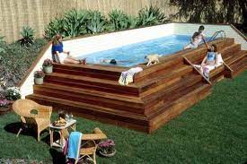 We can help you choose whichever will suit your family, budget and garden. Cool Above Ground Pool Ideas Above Ground Swimming Pools Designs Above Ground Swim Above Ground Pool Decks Above Ground Swimming Pools Pool Landscape Design