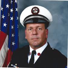 Kevin Oliver, Fire & Arson Investigative Sciences Training Specialist with  the National Fire Academy (NFA), was presented an award by Wayne Delancey,  current President of the NC Chapter of the…