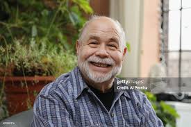 Richard Goldstein appears in a portrait taken in his home