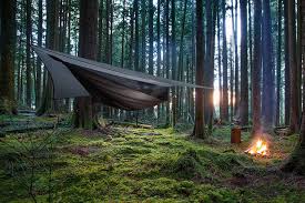 Snugged down to the ground on both sides around your hammock or angled to provide a large covered area as a group shelter. Hennessy Hammock Jungle Safari Zip Birrenco Com