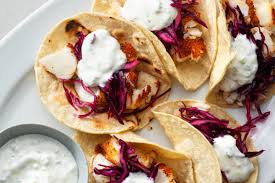 Baja fish tacos are loaded with fried fish, crunchy cabbage, pico de gallo, and a creamy fish taco sauce with plenty of lime juice squeezed over the top. Air Fried Fish Tacos For A Low Fat Taco Tuesday Or Fish Friday