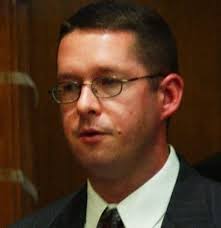 Arbitrator who awarded Kalamazoo detective his job back concluded evidence  that led to his firing was embellished, manufactured