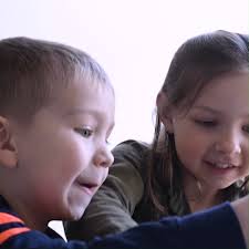 High school math teacher Miss Jenna Grove sang the National Anthem last  week before a volleyball game.