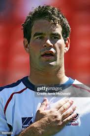 Francois Viljoen of USA is tackled by Pablo Gomez Cora of Argentina... News  Photo