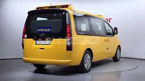 Image result for Dynamic Yellow 2025 Staria