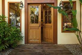 Door with hinges and locking handle. 8 Types Of Materials For Doors In Indian Homes Homify