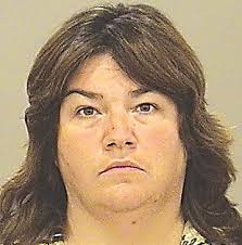 Woman charged in murder for hire